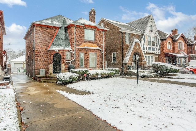 view of front of house with an outbuilding and a garage