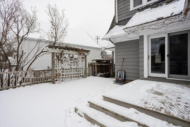 view of snow covered deck