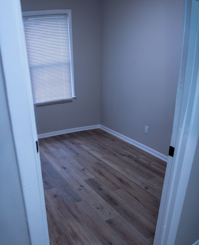 spare room featuring hardwood / wood-style floors