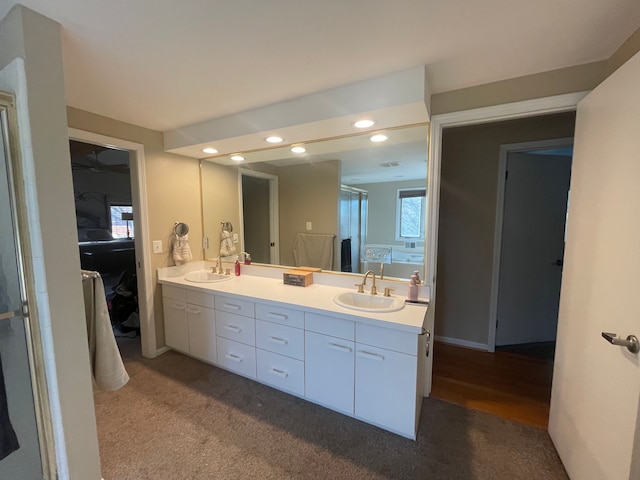 bathroom featuring hardwood / wood-style floors and vanity