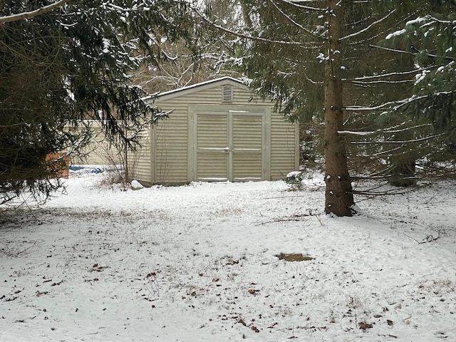 view of snow covered garage