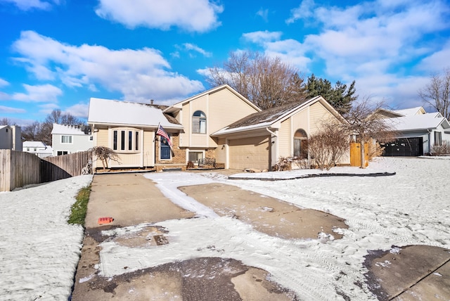 front of property with a garage