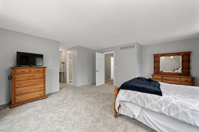 bedroom with light carpet