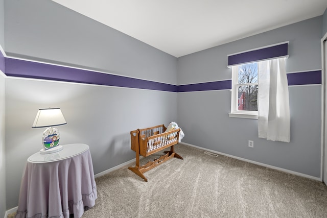 sitting room with carpet floors