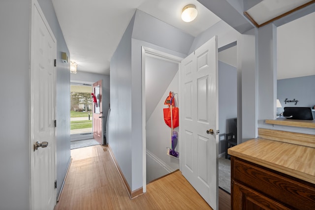 corridor featuring light hardwood / wood-style floors