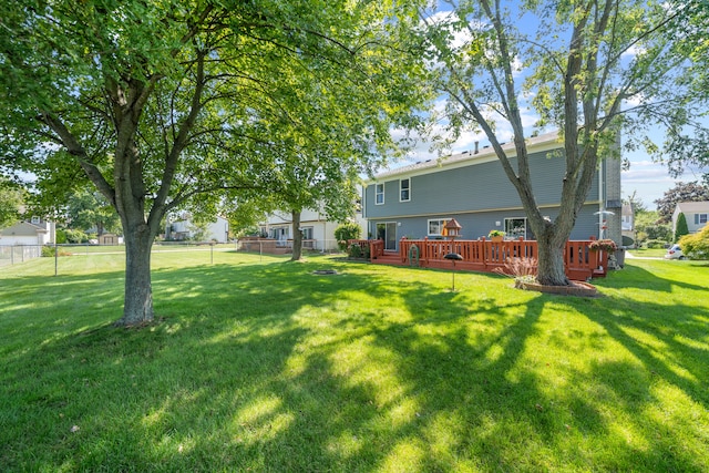 view of yard featuring a wooden deck