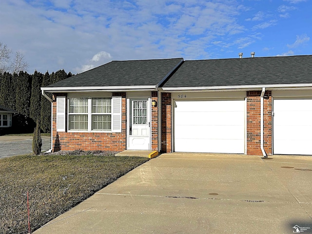 ranch-style home featuring a garage