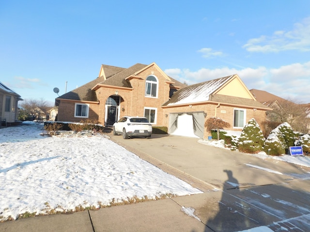 front of property with a garage