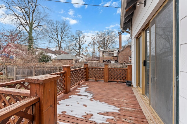 view of snow covered deck