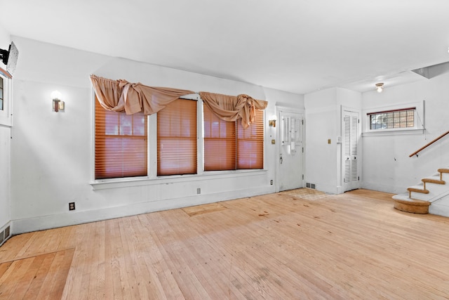 interior space with hardwood / wood-style flooring