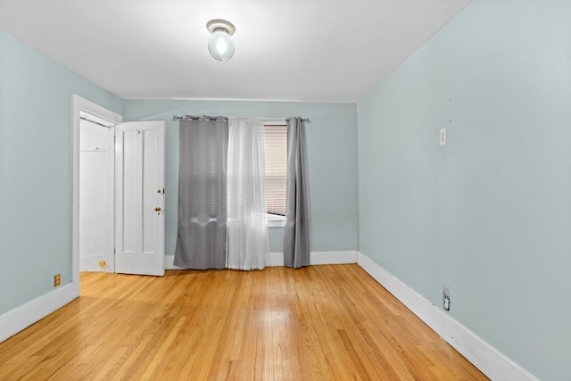 empty room with light wood-type flooring