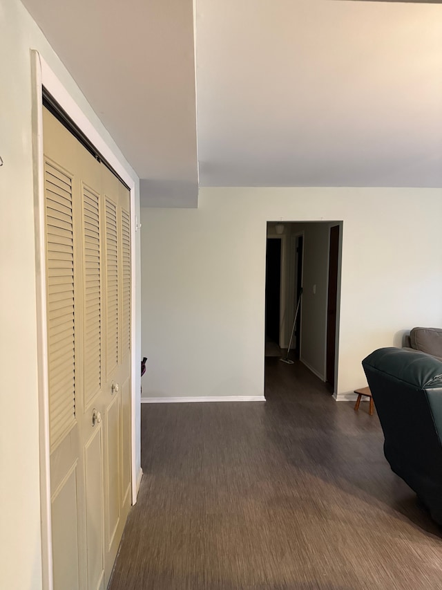 hallway featuring dark hardwood / wood-style flooring