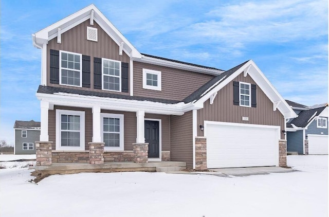 craftsman-style home with a garage