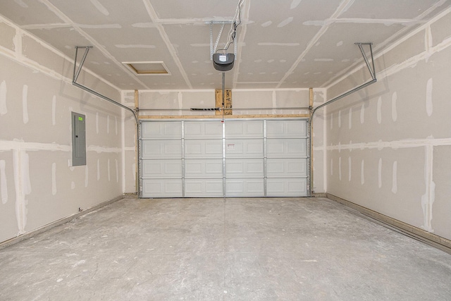 garage featuring a garage door opener and electric panel