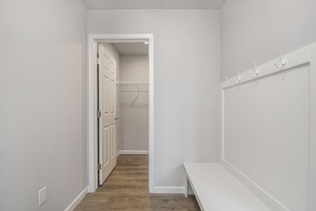 mudroom featuring wood finished floors and baseboards