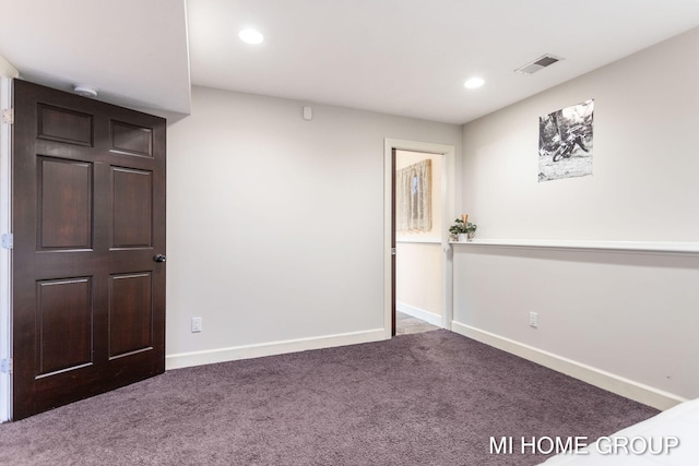 unfurnished bedroom with carpet flooring