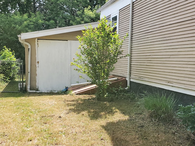 view of home's exterior featuring a yard