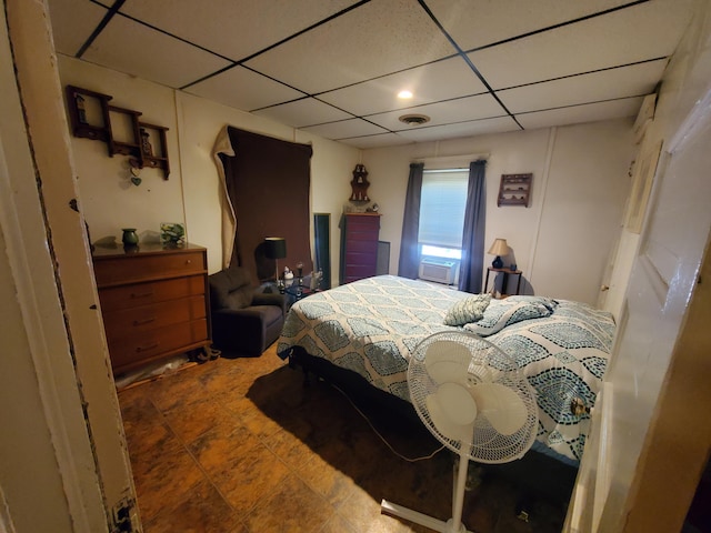 bedroom featuring a drop ceiling