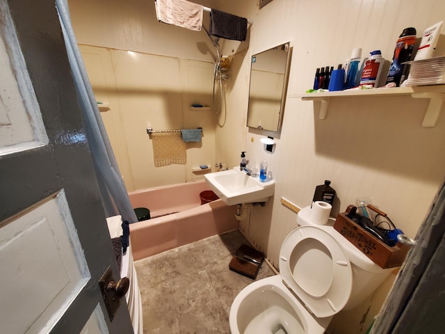 full bathroom featuring shower / tub combo, toilet, and sink