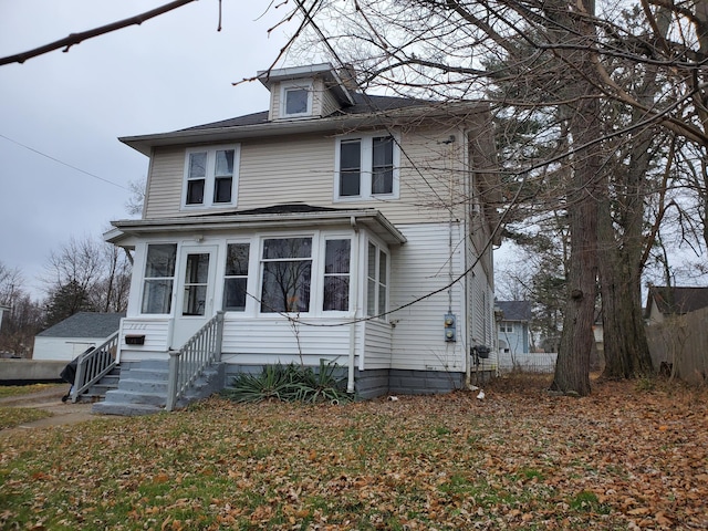 view of front facade featuring a sunroom