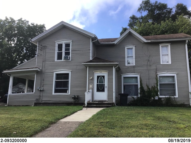 view of front of house with a front yard