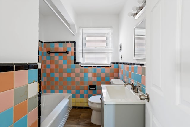 19723 Carrie St, Detroit, MI 48234 - bathroom with tile walls, vanity, and a wainscoted wall