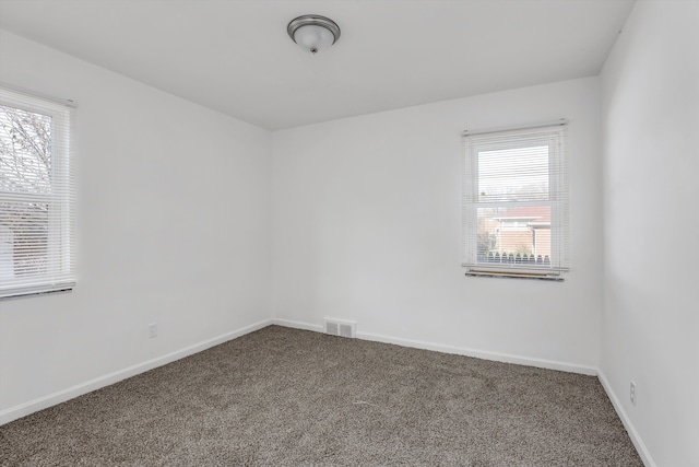 19723 Carrie St, Detroit, MI 48234 - carpeted spare room with baseboards