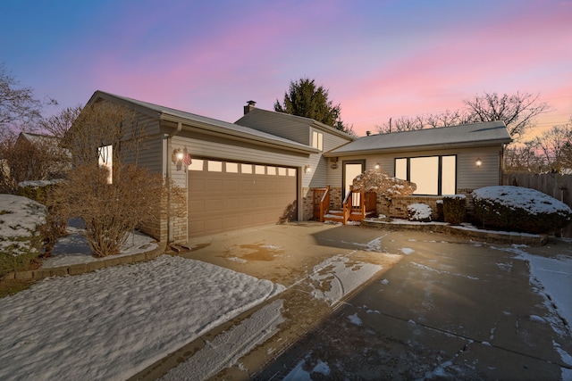 view of front of house with a garage