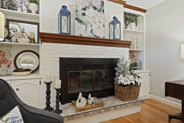 room details featuring hardwood / wood-style floors and a fireplace