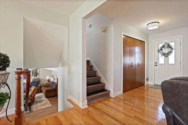 foyer with light wood-type flooring