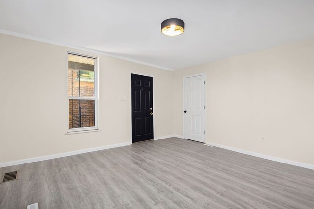 empty room featuring light hardwood / wood-style flooring