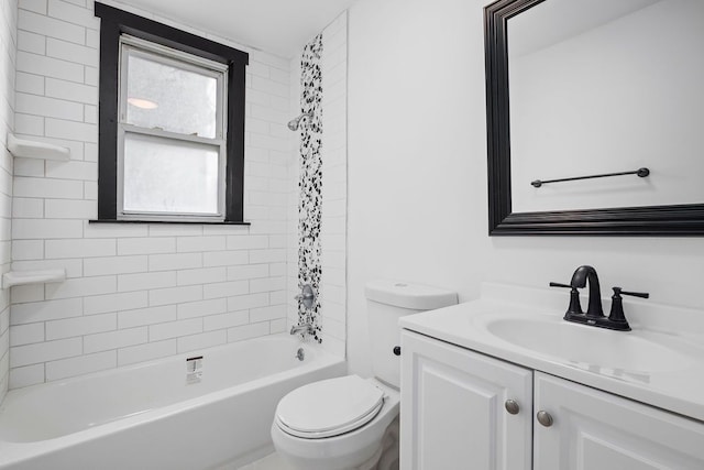 full bathroom with toilet, vanity, and tiled shower / bath combo