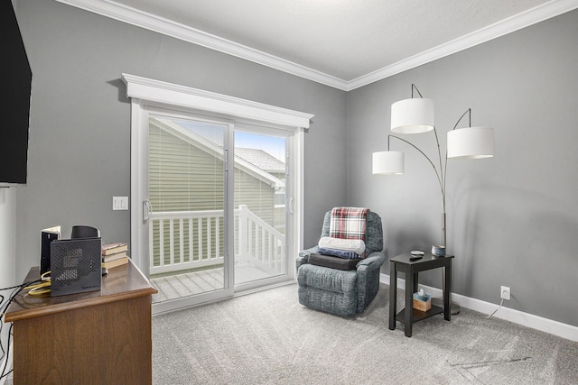 sitting room with carpet and ornamental molding