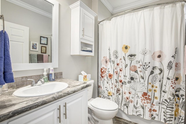 bathroom with a shower with curtain, vanity, toilet, and ornamental molding