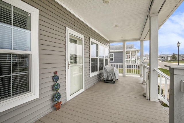 wooden deck featuring a porch