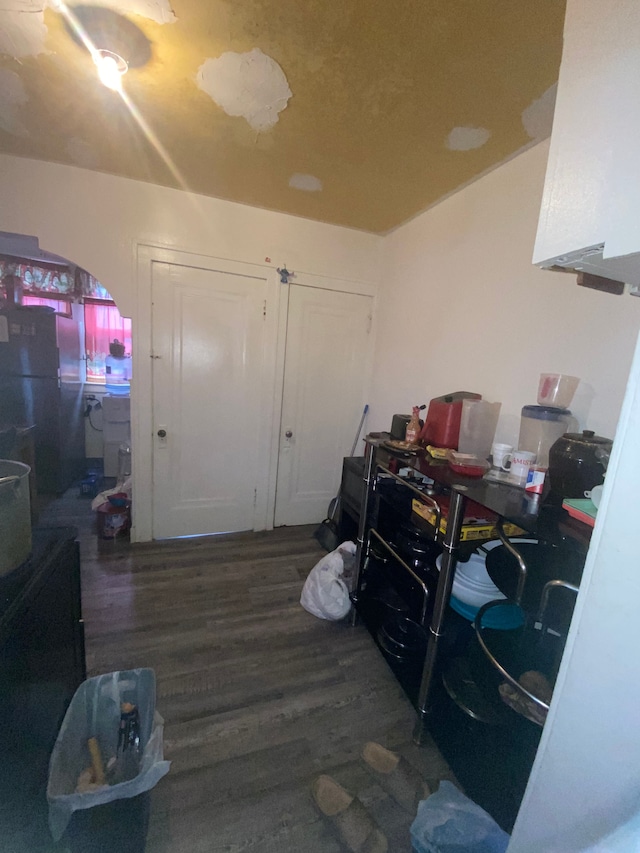 interior space with dark wood-type flooring