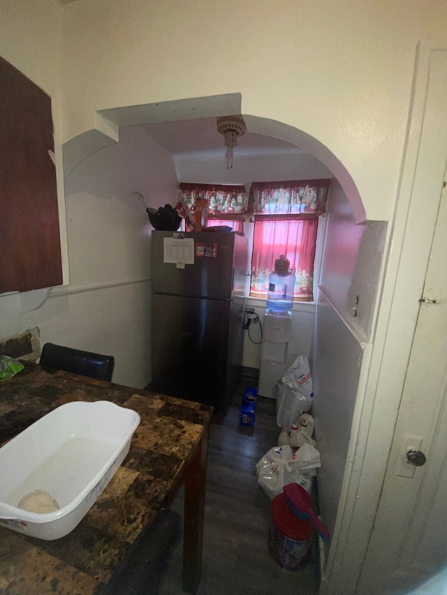 bathroom with wood-type flooring