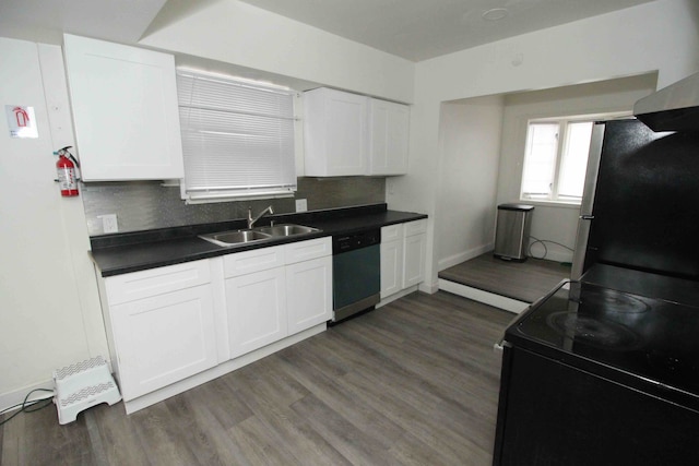 kitchen with sink, white cabinets, and appliances with stainless steel finishes