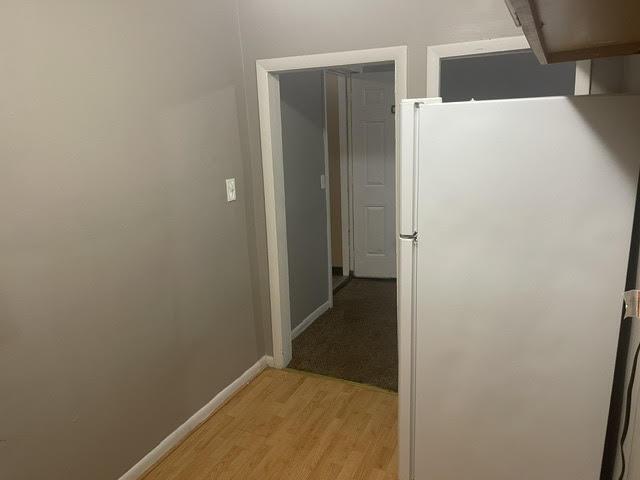 hallway featuring light wood-type flooring