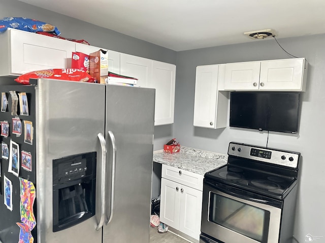 kitchen with white cabinetry and stainless steel appliances