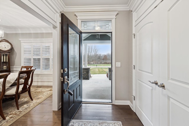 entryway featuring dark hardwood / wood-style floors and crown molding