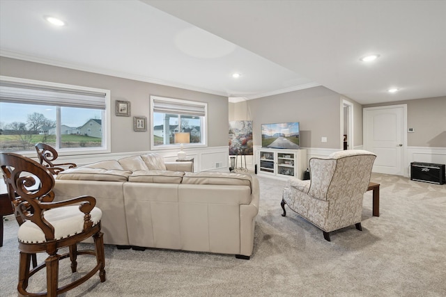 living room featuring crown molding and light colored carpet