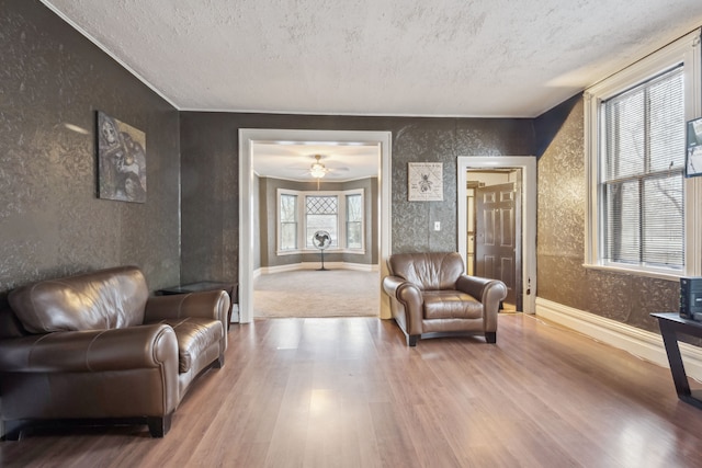 2619 Wabash St, Detroit, MI 48216 - living area featuring wood finished floors and a textured ceiling