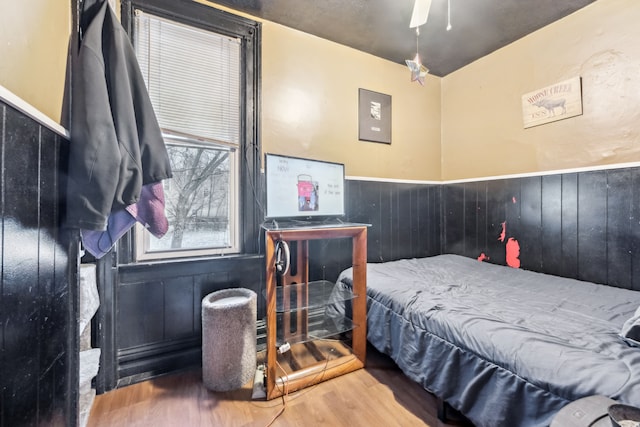 2619 Wabash St, Detroit, MI 48216 - bedroom featuring wood finished floors and wainscoting
