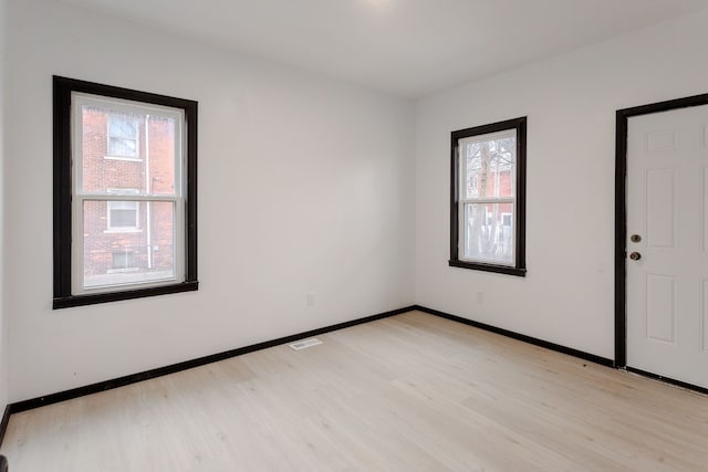 empty room featuring light wood-type flooring