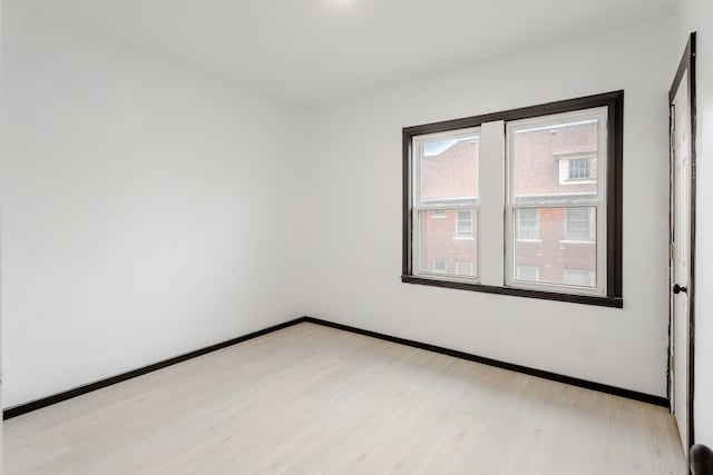 empty room featuring light hardwood / wood-style floors