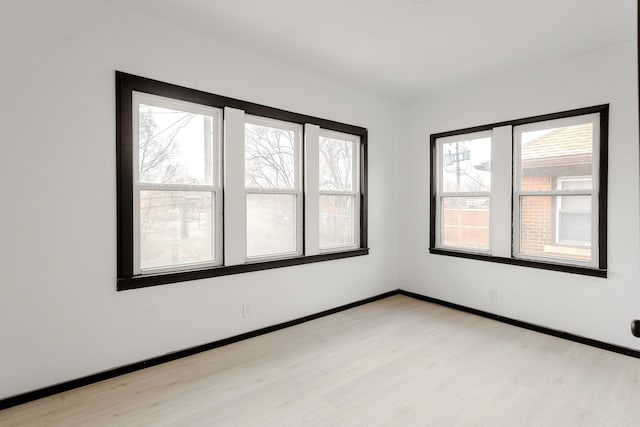 empty room featuring light hardwood / wood-style floors