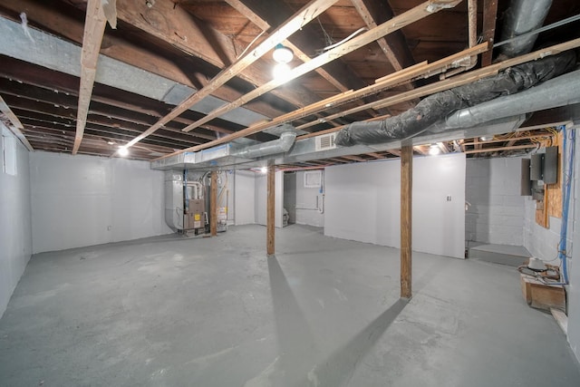 140 Stanley Ave, Jackson, MI 49203 - unfinished basement featuring heating unit