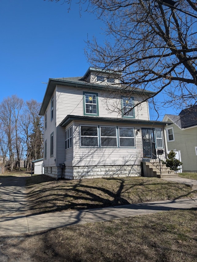 140 Stanley Ave, Jackson, MI 49203 - view of american foursquare style home