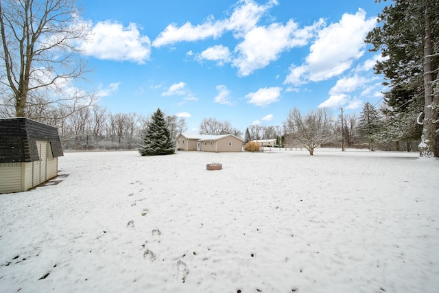 view of yard covered in snow